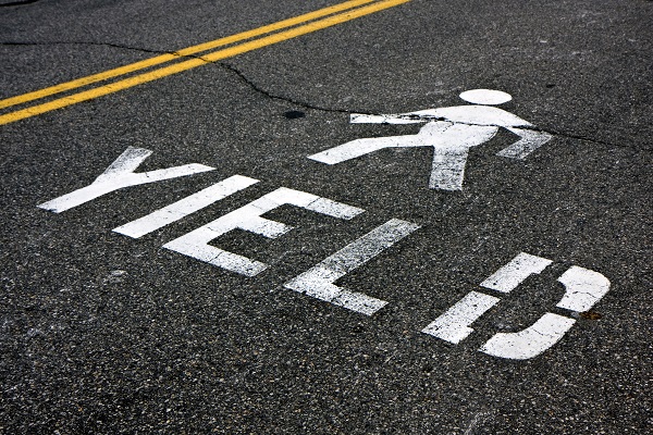 Pedestrian yield sign on a road